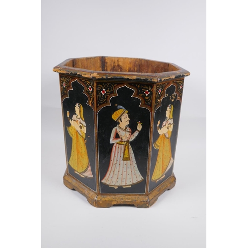 197 - An Indian octagonal wood planter with hand painted figural decoration to each panel, 31cm high