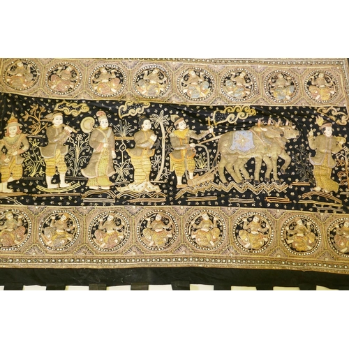 199 - An oriental stumpwork wall hanging depicting a procession with oxen and plough, 213 x 150cm