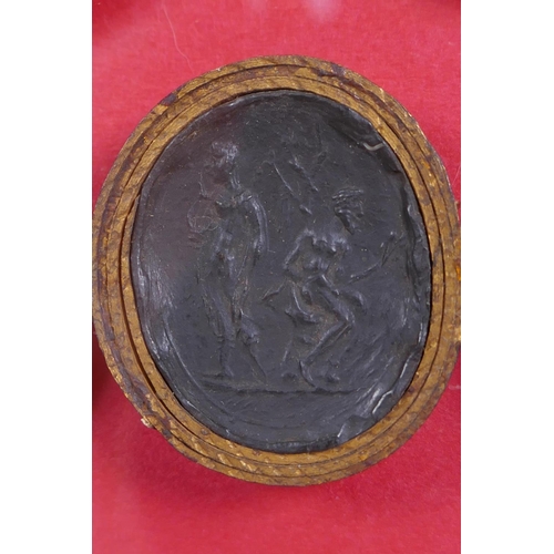 2 - A framed set of C19th Grand Tour Intaglios depicting classical figures, each individually wrapped in... 