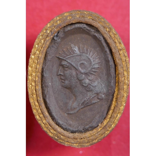 2 - A framed set of C19th Grand Tour Intaglios depicting classical figures, each individually wrapped in... 