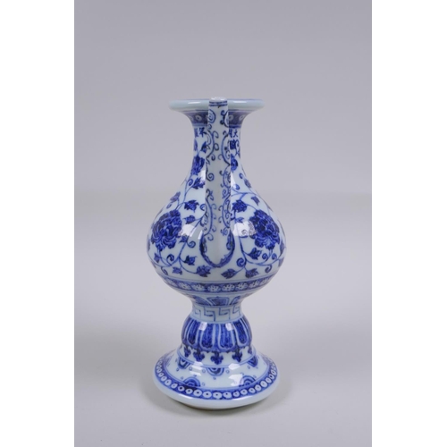 205 - A Chinese blue and white porcelain pourer with scrolling lotus flower, 22cm high, Xuande 6 character... 