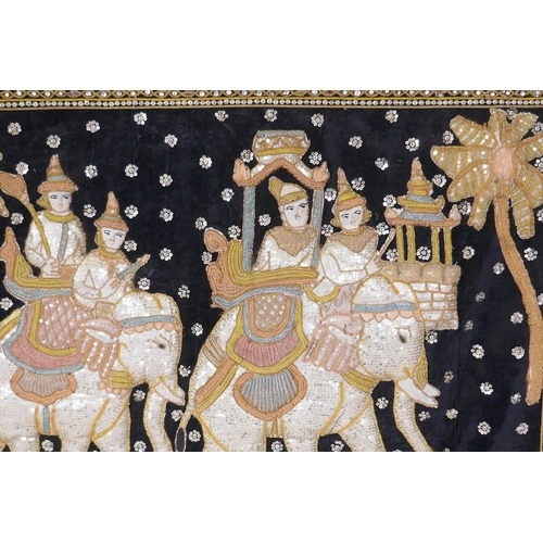 206 - An Indian stumpwork depicting a procession with elephants, mounted in a gilt frame, 82 x 155cm