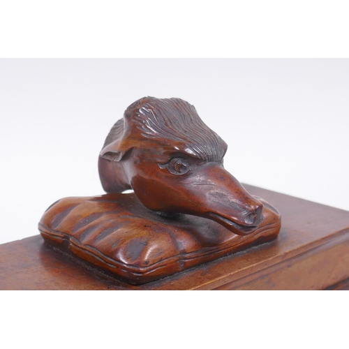 21 - A C19th mahogany Black Forest needle box with a deer head mount and carved paw feet, 20 x 10cm