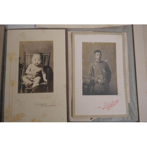 214 - A collection of late C19th and early C20th Japanese portrait photographs, 15 x 10cm largest