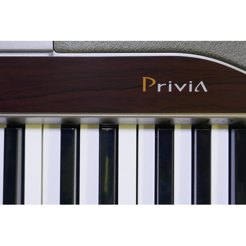 216 - A Casino Privia PX110 Digital Piano and stand, unused, keyboard 135cm long