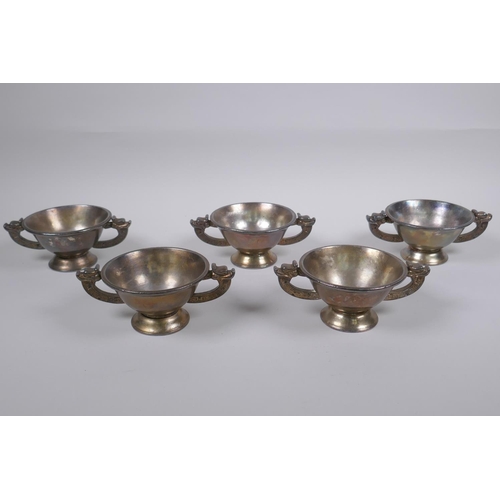 218 - A set of five Chinese silvered metal cups/bowls with two dragon handles, 10 cm diameter