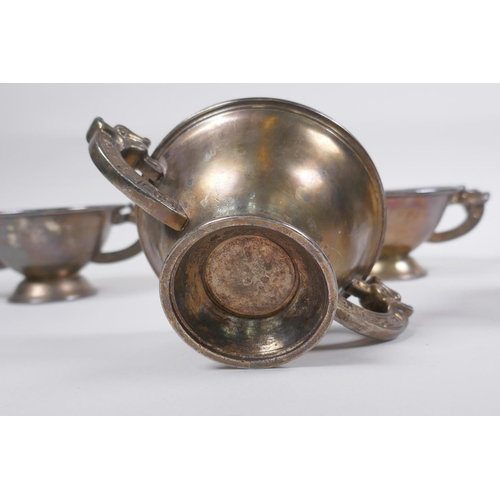 218 - A set of five Chinese silvered metal cups/bowls with two dragon handles, 10 cm diameter