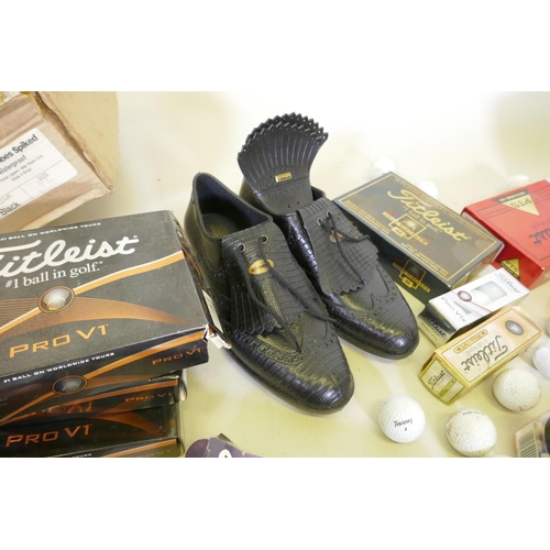 219 - A quantity of Fitleist golf balls, tree, golf shoes size 8½ (waterproof)