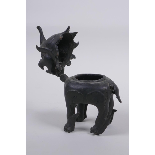 23 - A Chinese Ming Dynasty bronze censer in the form of a kylin, with historic repairs and losses, 12cm ... 