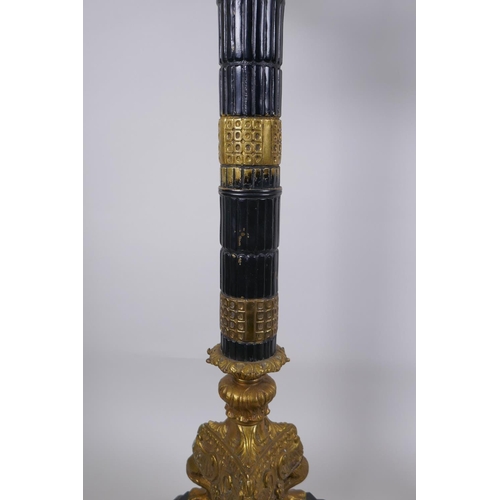 26 - A pair of Empire style bronze and ormolu Corinthian column four branch candelabra, 80cm high