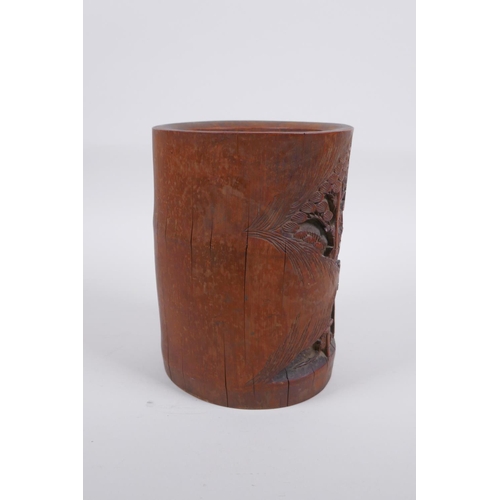 28 - A late C19th/early C20th Chinese carved bamboo brush pot decorated with scholars in a bamboo forest,... 