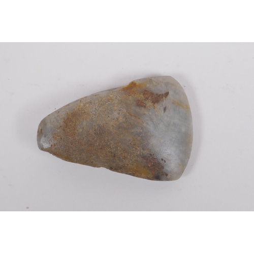 29 - A Neolithic polished hardstone axe head, 8 x 5cm