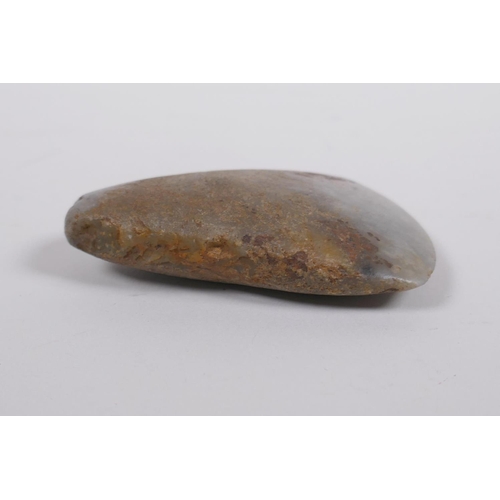 29 - A Neolithic polished hardstone axe head, 8 x 5cm