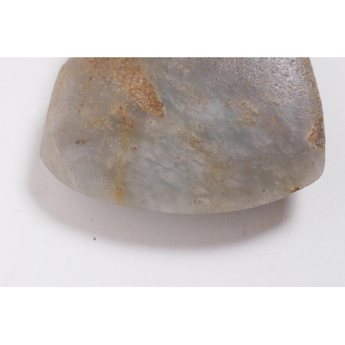 29 - A Neolithic polished hardstone axe head, 8 x 5cm