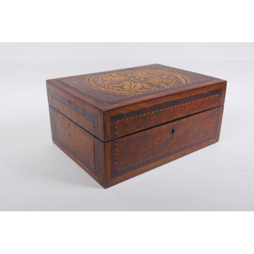 36 - A Victorian inlaid burr walnut work box with parquetry decoration to the lid, 28 x 20cm, 13cm high