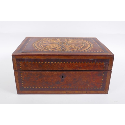 36 - A Victorian inlaid burr walnut work box with parquetry decoration to the lid, 28 x 20cm, 13cm high