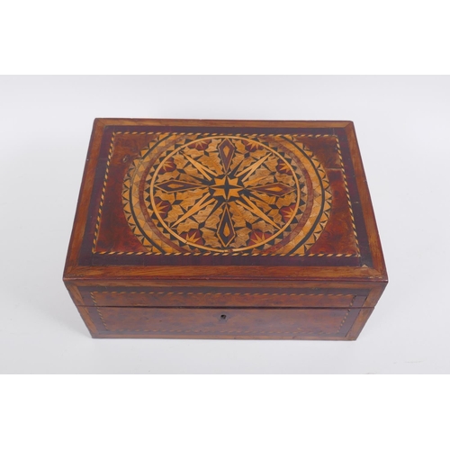 36 - A Victorian inlaid burr walnut work box with parquetry decoration to the lid, 28 x 20cm, 13cm high