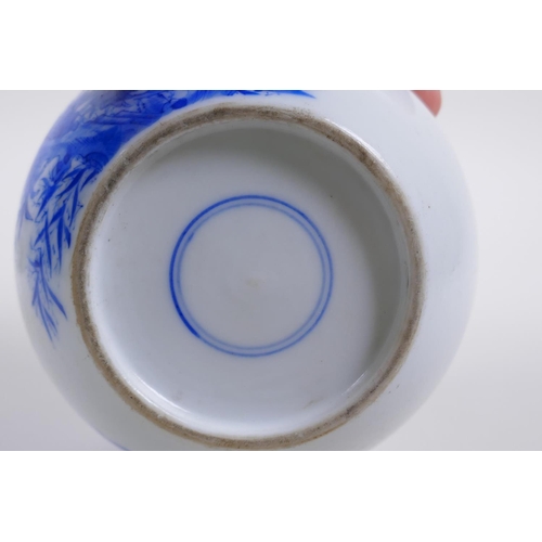 40 - A Chinese Qing dynasty blue and white porcelain pot with rolled rim and decorated with asiatic birds... 