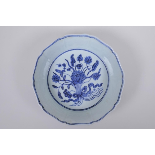 45 - A blue and white porcelain steep sided dish with lobed rim and lotus flower decoration, Chinese Xuan... 