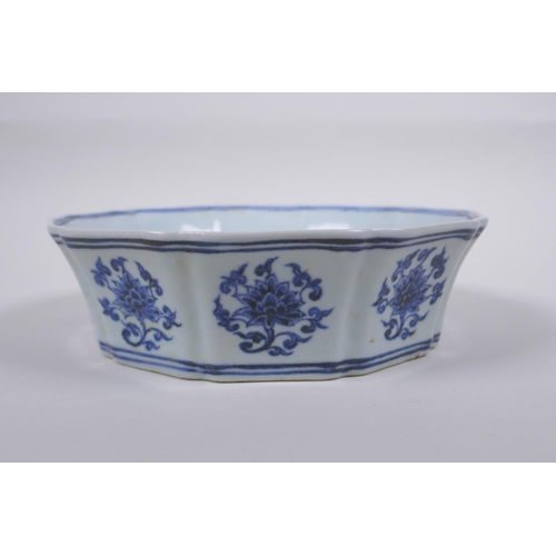 45 - A blue and white porcelain steep sided dish with lobed rim and lotus flower decoration, Chinese Xuan... 