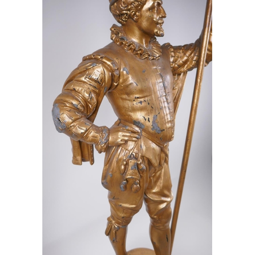 49 - A gilt spelter figural lamp in the form of a Renaissance gentleman, 86cm high