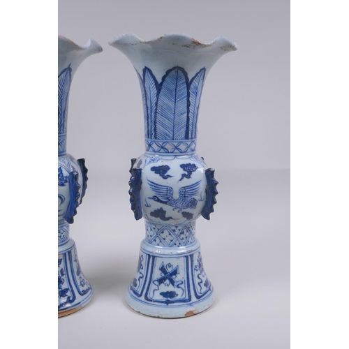 53 - A pair of Chinese Ming style blue and white porcelain gu shaped vases with phoenix and lotus flower ... 