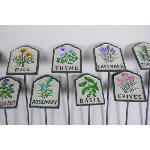 54 - A set of twelve painted cast iron herb markers, 27 cm long