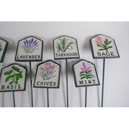 54 - A set of twelve painted cast iron herb markers, 27 cm long