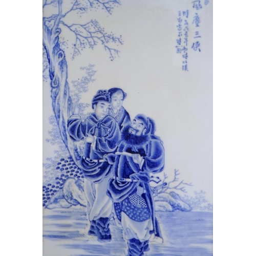 63 - A Chinese Republic blue and white porcelain plaque depicting figures in a landscape, mounted in a ha... 