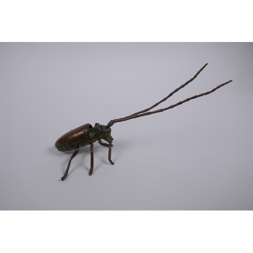 65 - A Japanese Jizai style bronze beetle with articulated li8mbs, 12cm long