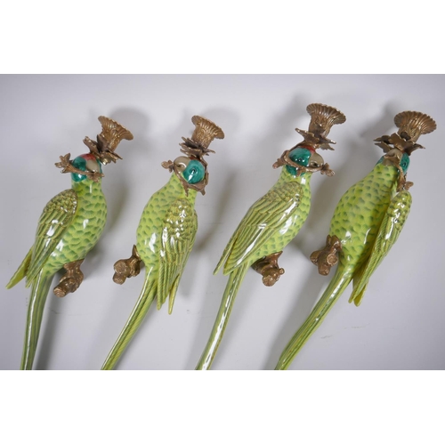 69 - Two pairs of polychrome porcelain and gilt metal parrot sconces, 47cm long