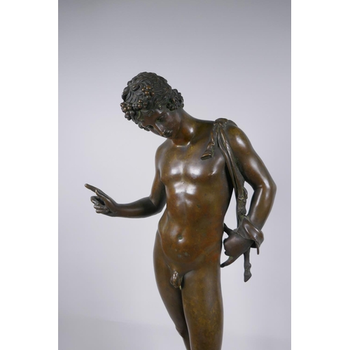 7 - A C19th Grand Tour bronze figure of Narcissus, mounted on a wooden stand, 66cm high