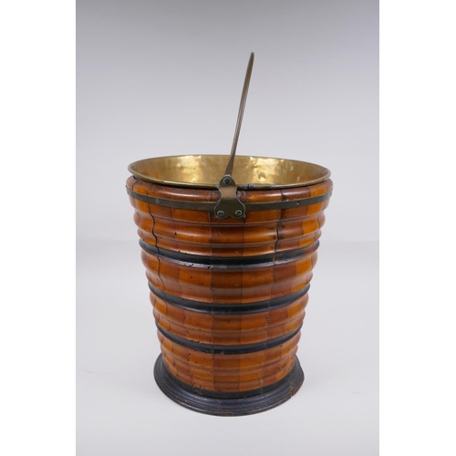 72 - A Dutch coopered fruitwood and brass lined peat bucket with ebonised bands, 32cm high x 29cm diamete... 