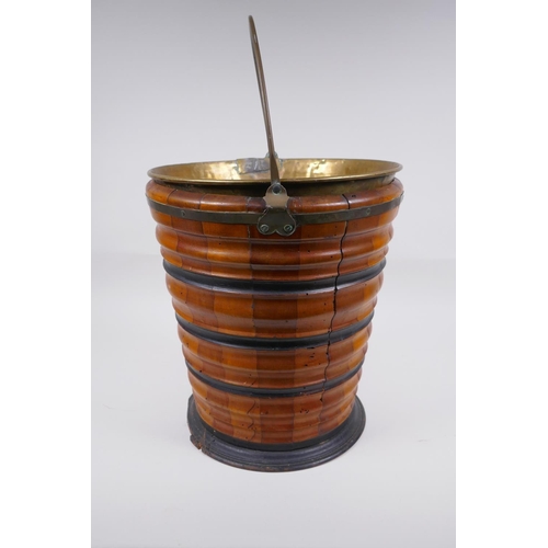 72 - A Dutch coopered fruitwood and brass lined peat bucket with ebonised bands, 32cm high x 29cm diamete... 