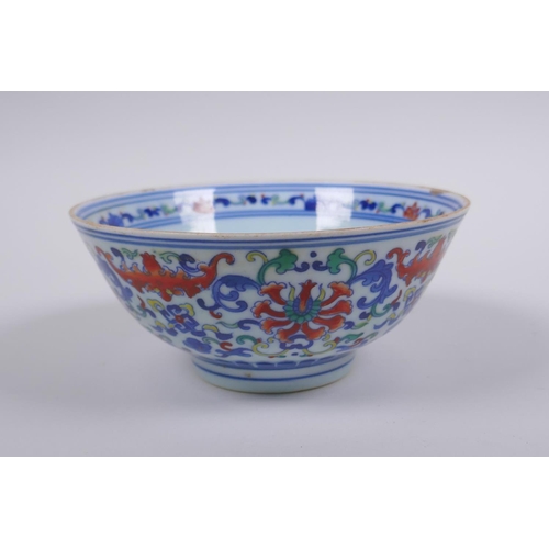 78 - A Chinese wucai porcelain rice bowl decorated with bats and lotus flowers, YongZheng 6 character mar... 