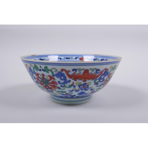 78 - A Chinese wucai porcelain rice bowl decorated with bats and lotus flowers, YongZheng 6 character mar... 