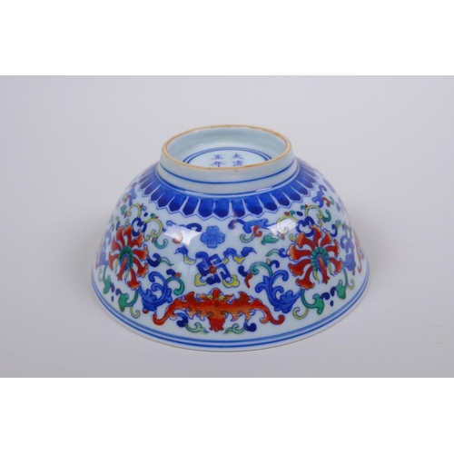 78 - A Chinese wucai porcelain rice bowl decorated with bats and lotus flowers, YongZheng 6 character mar... 