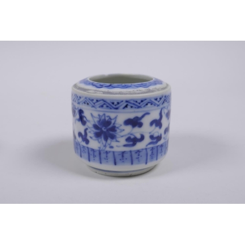 79 - A Chinese blue and white porcelain cylinder pot, a miniature porcelain tea bowl, and a miniature por... 