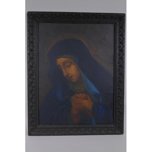 821 - An C18th/C19th portrait of The Madonna at prayer, in the manner of Giovanni Battista Salvi, oil on c... 