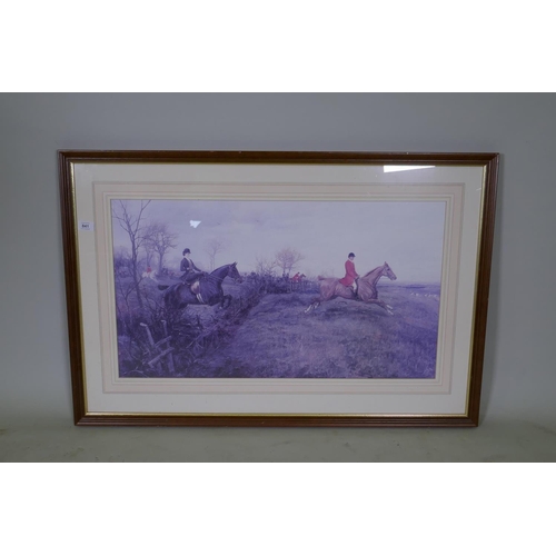 841 - In the manner of Lionel Edwards, lithoprint of horses jumping a hedgerow, 81 x 45cm