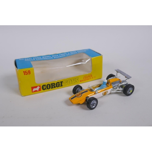 89 - Corgi 158 Lotus Climax F/1 with driver controlled steering, and Corgi 159 Cooper Maserati F/1, both ... 