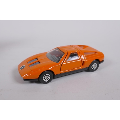 91 - Corgi 388 Mercedes Benz C111, Whizzwheels in original box, a Corgi 341 Mini Marcos GT850, with take-... 