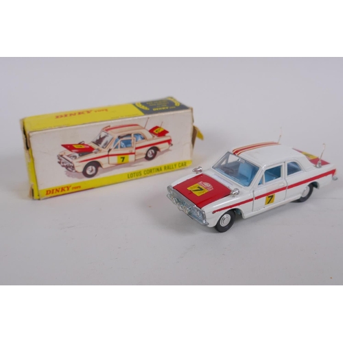 93 - Dinky 138 Hillman Imp Saloon, complete with suitcase and original box, and a Dinky 205 Lotus Cortina... 