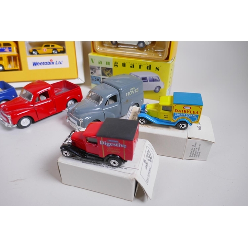 97 - A Special Edition Weetabix Corgi Collection Box containing an Aston Martin DB6, a London bus and an ... 