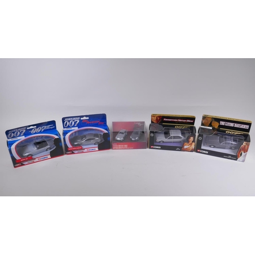 98 - Four Corgi James Bond 007 diecast model cars, including the Aston Martin Volante (04801) from The Li... 