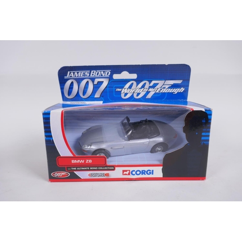 98 - Four Corgi James Bond 007 diecast model cars, including the Aston Martin Volante (04801) from The Li... 