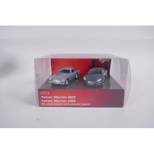 98 - Four Corgi James Bond 007 diecast model cars, including the Aston Martin Volante (04801) from The Li... 