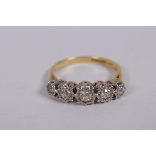 661 - An 18ct yellow gold ring set with five old cut diamonds, 0.3ct, 3.8g gross