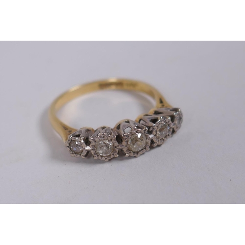 661 - An 18ct yellow gold ring set with five old cut diamonds, 0.3ct, 3.8g gross