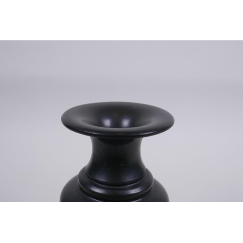 317 - A Chinese black ground YiXing reticulated vase, impressed marks to base, 15cm high